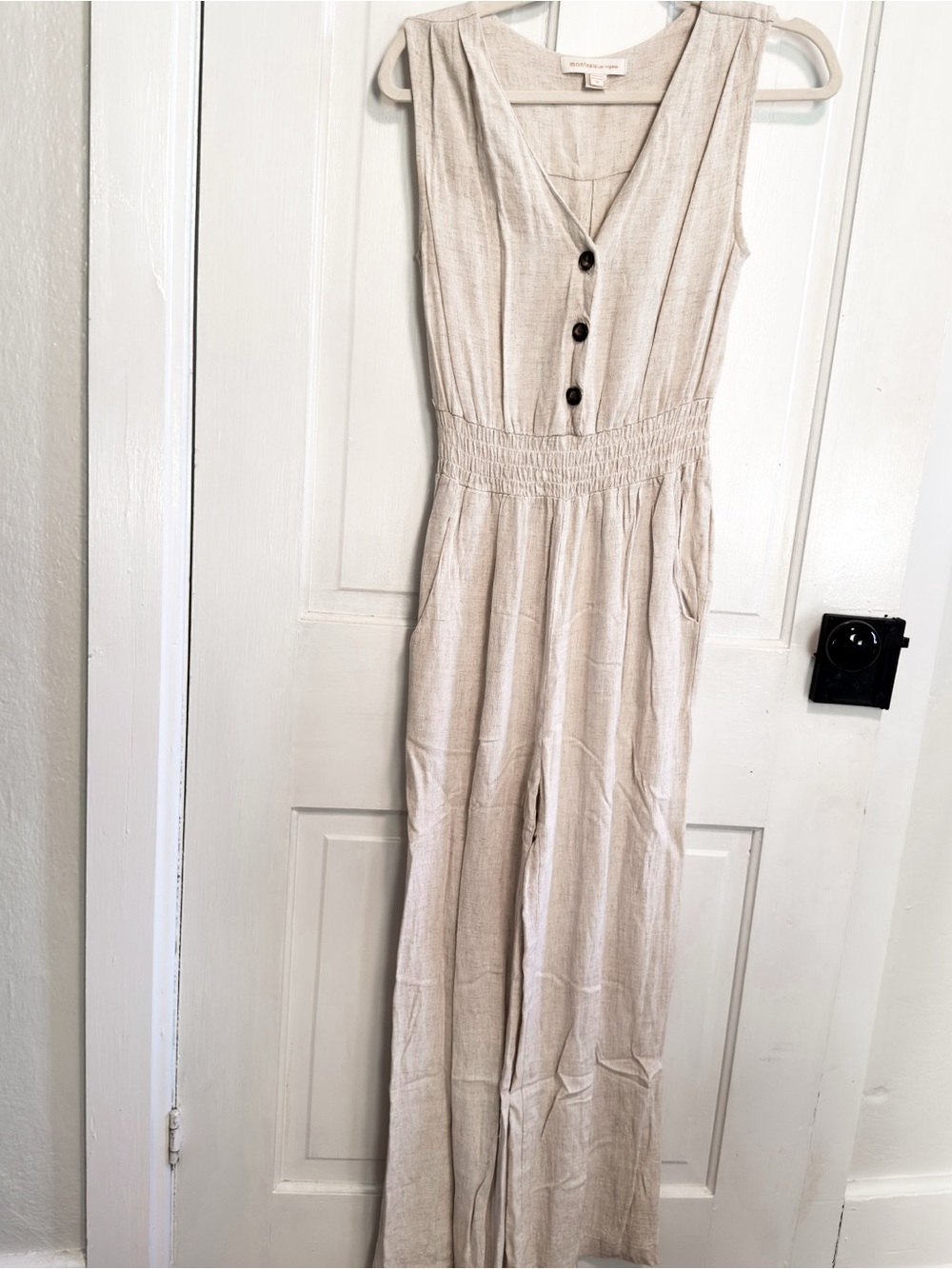 Sleeveless Beige Button-Front Smocked-Waist Jumpsuit